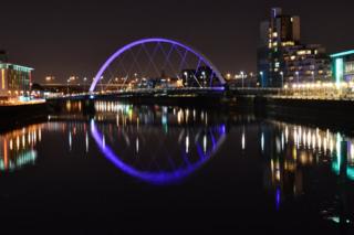 Glasgow skyline on Clyde at night