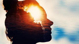 Silhouette of women and sky