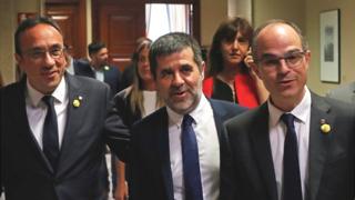 Jailed Catalan politicians (L-R) Josep Rull, Jordi Sanchez and Jordi Turull registered on 20 May as MPs