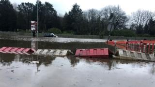 A car park in Pontypridd is submerged with flood water
