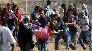 Protesters near the border between the Gaza Strip and Israel, 10 October 2015