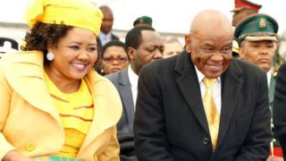 Newly appointed Lesotho prime Minister Thomas Thabane (C), leader of the All Basotho Convention (ABC) political party, his wife "Ma Isaiah Ramoholi Thabane (L) and Lesotho King Letsie III (R) react during Thabane"s inauguration on June 16, 2017 in Maseru