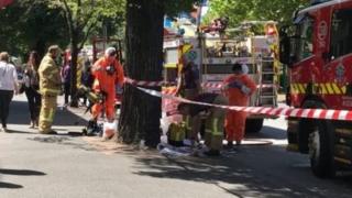 Emergency workers near the Melbourne consulates of India and France