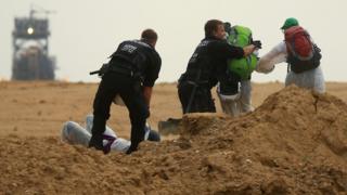 Police trying to prevent activists entering the mine