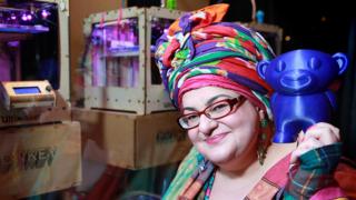 Camila Batmanghelidjh at the launch of Print Happiness, a pop-up store in London's Soho, a head and shoulders shot while holding a 3D printed toy, taken in 2013