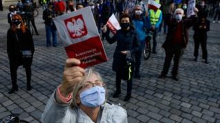 People wearing masks at a rally in Wroclaw, Poland, calling for the postponement of the presidential election. Photo: 3 May 2020