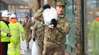 Soldiers assist with flood defences in the Upper Calder Valley in West Yorkshire