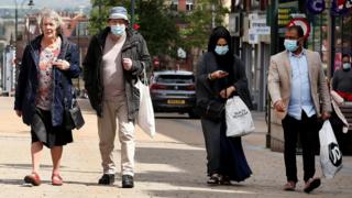 Shoppers walking in Oldham
