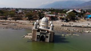 This aerial image shows a damaged mosque in Palu in Indonesia's Central Sulawesi on October 4, 2018, after an earthquake and tsunami hit the area on September 28.