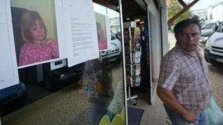 Photographs of Madeleine McCann are pasted onto a shop front on 4 May 2007 in the area of the Ocean Club apartment hotel in Praia da Luz in Portugal
