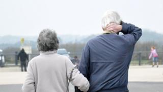 Two pensioners walking in West Sussex