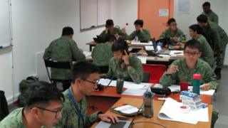 Singapore Armed Forces personnel conduct contact tracing in efforts to prevent the spread of the Wuhan coronavirus, in Singapore, January 28, 2020