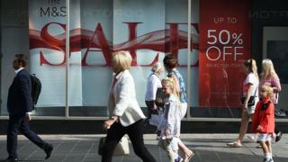 Shoppers on a high street