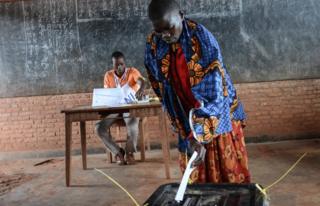 A woman casts her vote at a polling station in Ciri, northern Burundi, on May 17, 2018 during a referendum on constitutional reforms that, if passed, will shore up the power of incumbent President and enable him to rule until 2034.
