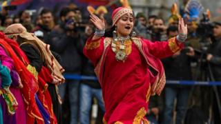 Youths dance during the Republic Day parade at Sher-i-Kashmir cricket Stadium in Srinagar on 26 January 2020.