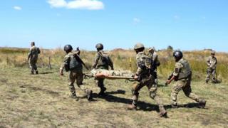військові