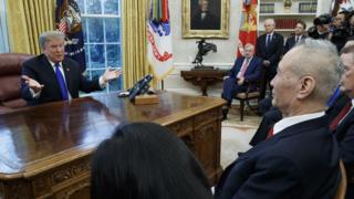 US President Donald J. Trump (L) talks with Vice Premier of the People