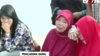 Distressed relatives wait for news of the stricken ferry