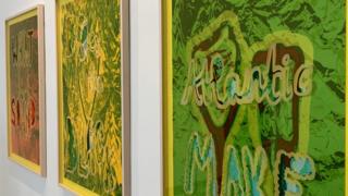 Three prints depicting slingshots