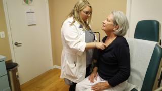 Marian Smith visits registered nurse practitioner Rachel Eisenberg for a check-up at a Planned Parenthood health centre in West Palm Beach, Florida, on 23 June 2017