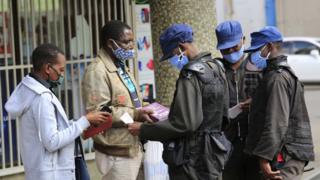 police check people's papers in Harare, 06 June