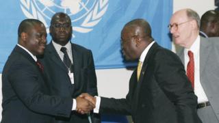 Nana Akufo-Addo den den Assistant-Secretary-General at the United Nations Department of Peacekeeping Operations Hedi Annabi time wey ei be Foreign Minister for Ghana, now he be Ghana President