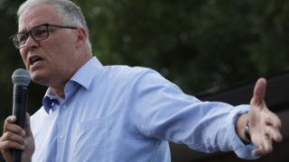 Jay Inslee speaks at the state fair in Iowa