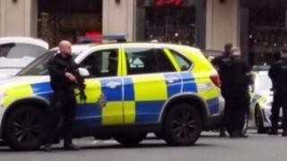 Armed police in Leeds city centre