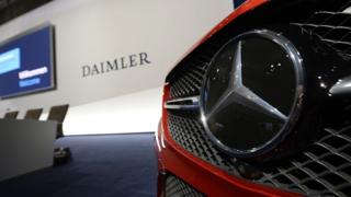 A Mercedes-Benz star is displayed prior to the annual press conference of German auto giant Daimler
