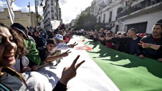 Algerian protesters take part in an anti-government demonstration in the capital Algiers on Tuesday 10 December 2019