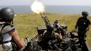 Ukrainian army troops firing anti-aircraft gun near Mariupol - July, 2015