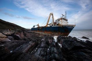 A view of the abandoned ghost ship Alta stuck on the rocks of the Irish coast