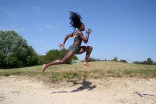 Team GB athlete Desiree Henry trains at a golf course in Edmonton, London