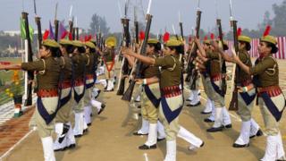 Police personnel take part in a Republic Day parade with Lee-Enfield .303 rifles in Noida on 26 January 2020.