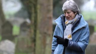 Theresa May leaves church, near High Wycombe, on Sunday