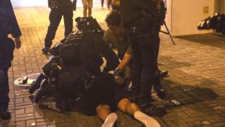 Riot police officers arrest a protester during during a protest in Prince Edward, Hong Kong, China on August 31, 2019.