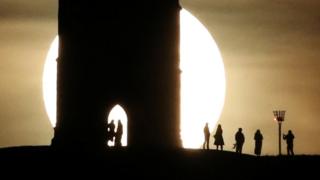 Full moon seen by Glastonbury Tor