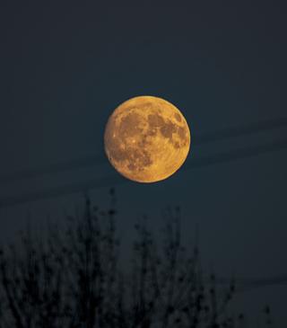 Moonrise over Milcombe on a late afternoon