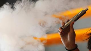 File image showing person using an e-cigarette