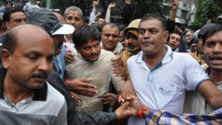 Hardik Patel, centre, after he was denied permission to hold a rally in Surat