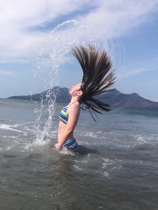 Anna Jones on holiday at Laig Bay, Eigg, with Rum in the background.
