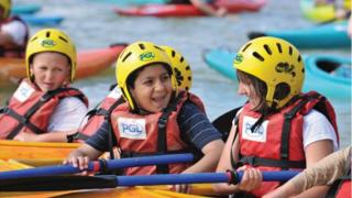 Children in canoes