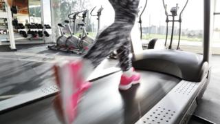 A woman running on the treadmill