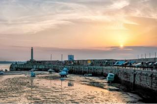 A harbour at sunset