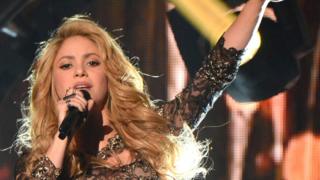 Image shows Shakira performing in 2014
