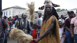 A typical traditional Ghanaian outfit worn by fetish priests