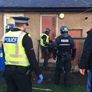 Police officers on raid