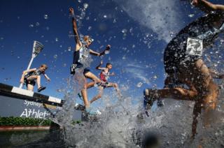 Competitors race in the under-16 boys steeplechase during the Australian Track and Field Championships at Sydney Olympic Park Athletic Centre on 3 April 2019 in Sydney, Australia.