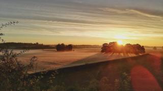 Sunrise over fields