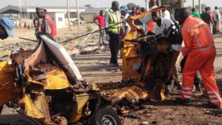Remains of vehicle after suicide bombings in Maiduguri